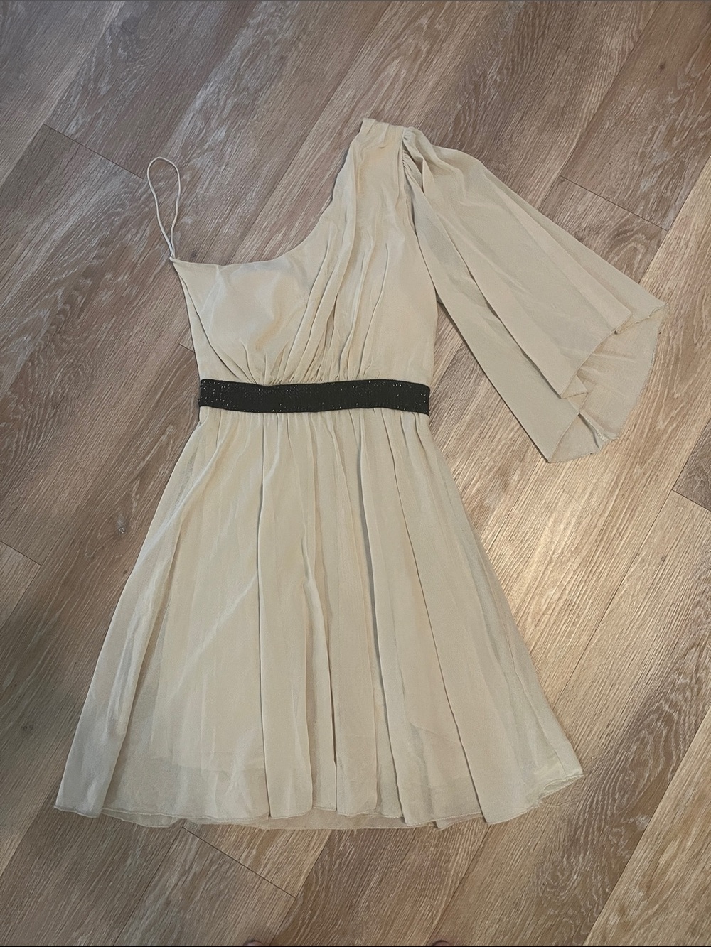 Elegant One-Shoulder Cream Party Dress with Black Waistband